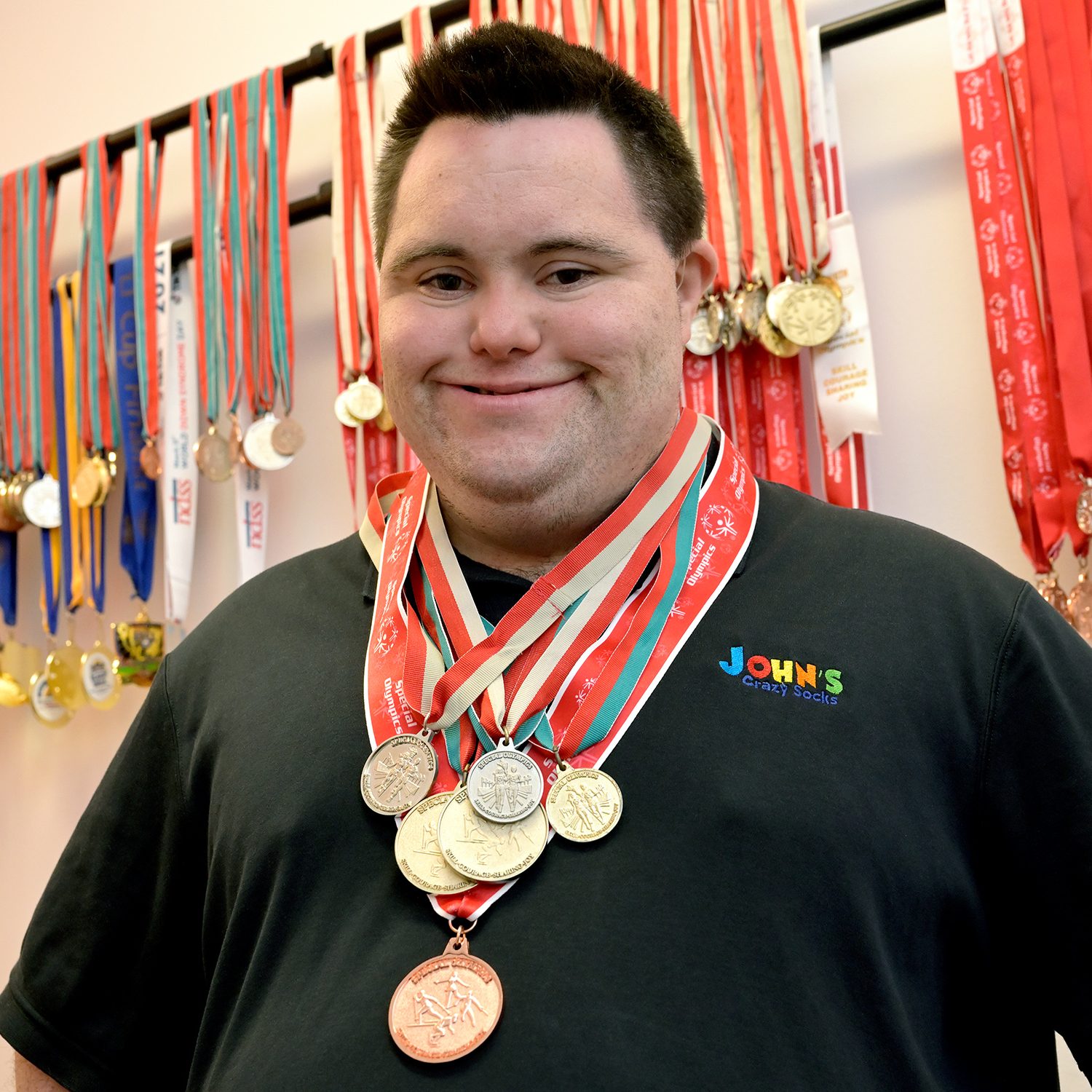John with Special Olympics Medals